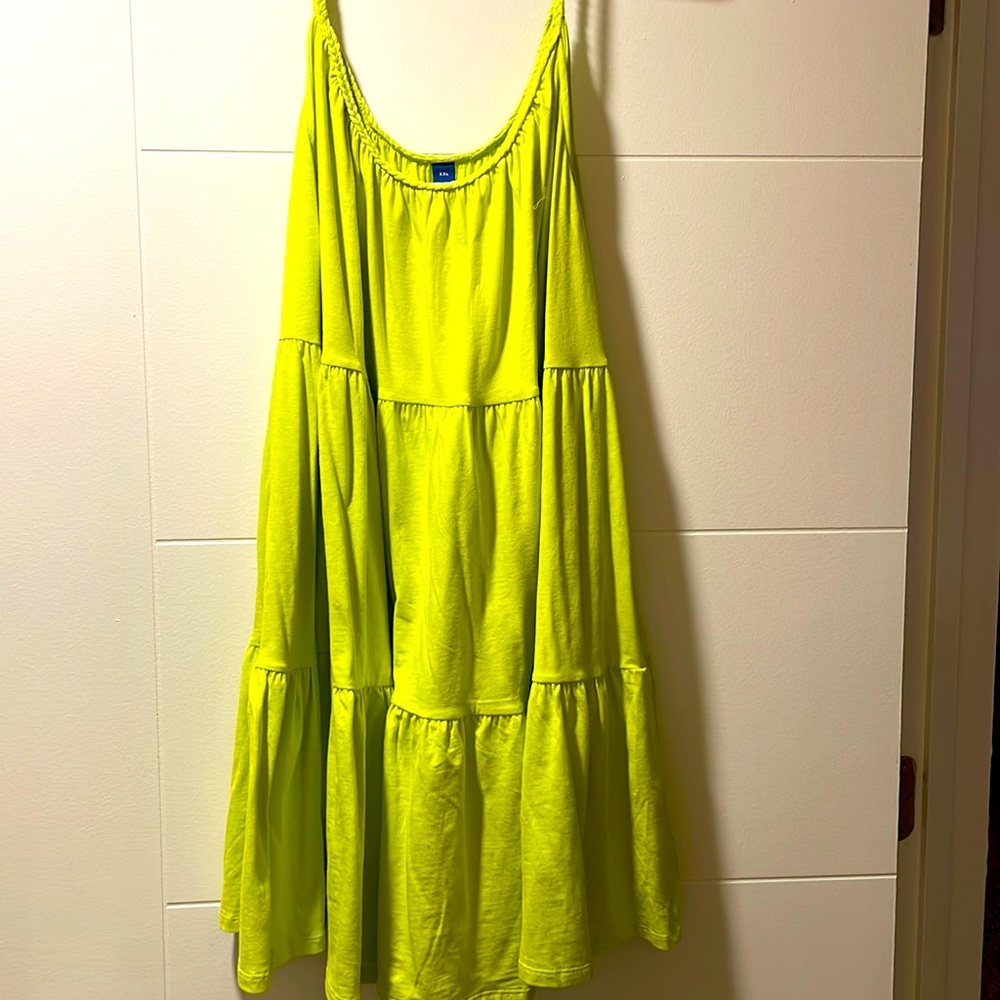 Brand new perfect for layering with a cardigan or wearing it with skinny jeans.
